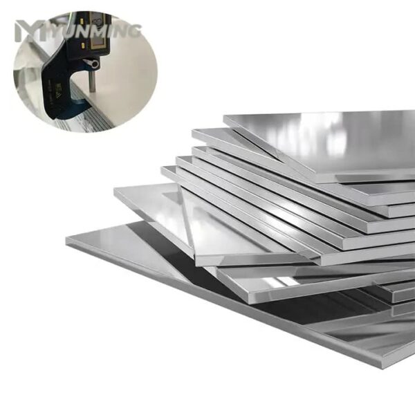 High-gloss cold rolled stainless steel plates with mirror finish and thickness inspection tool.