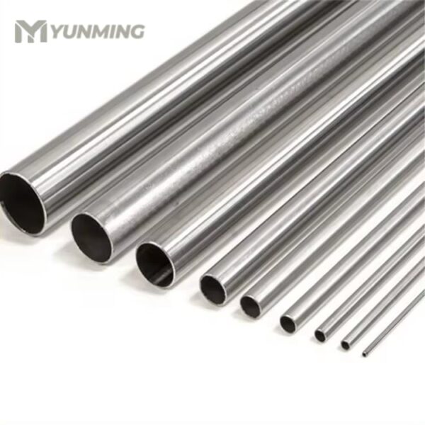 Stacked stainless steel seamless pipes in warehouse