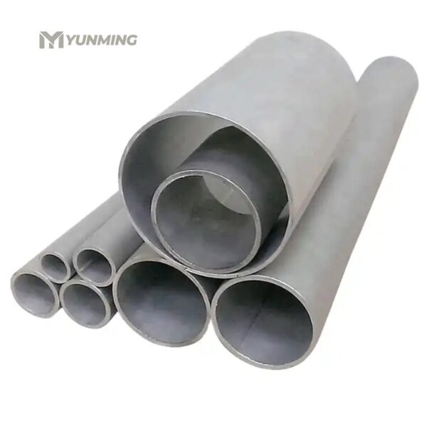 Large diameter stainless steel industrial pipes stacked for transport