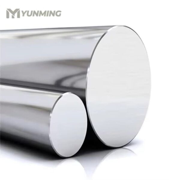 Close-up of two polished stainless steel round bars