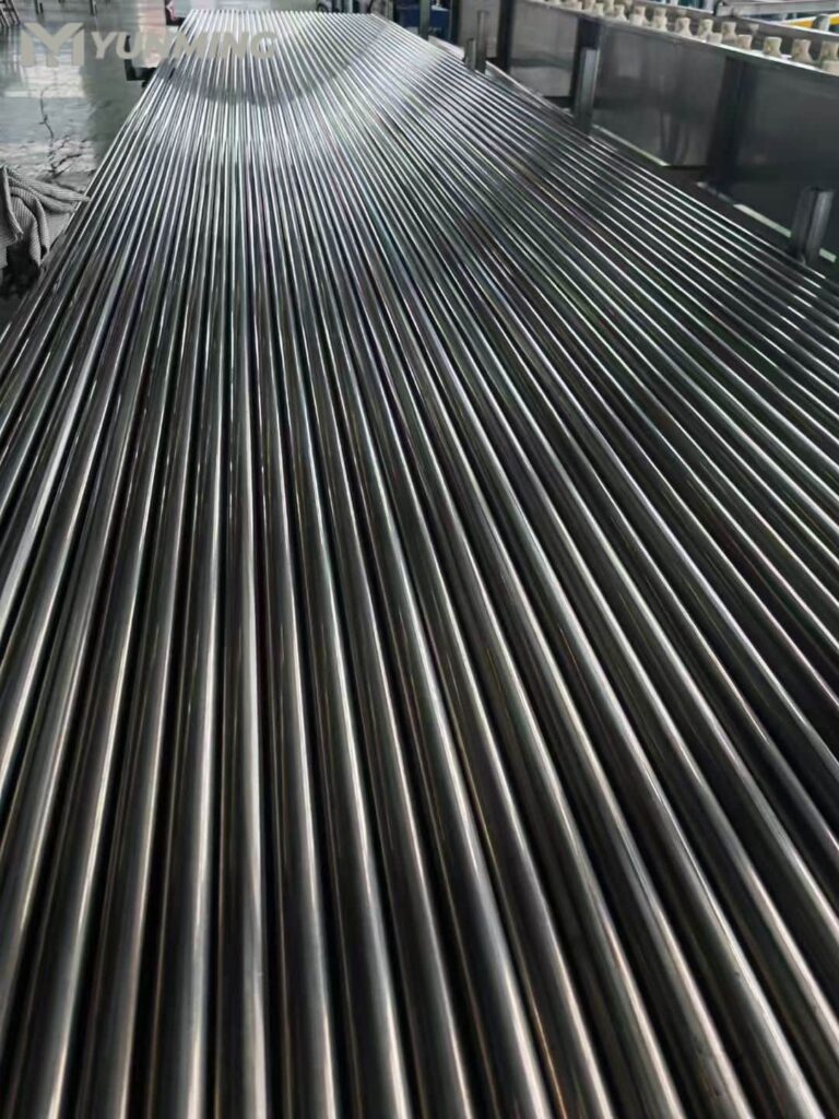 Polished stainless steel tubes in factory with smooth surface finish ready for decorative processing